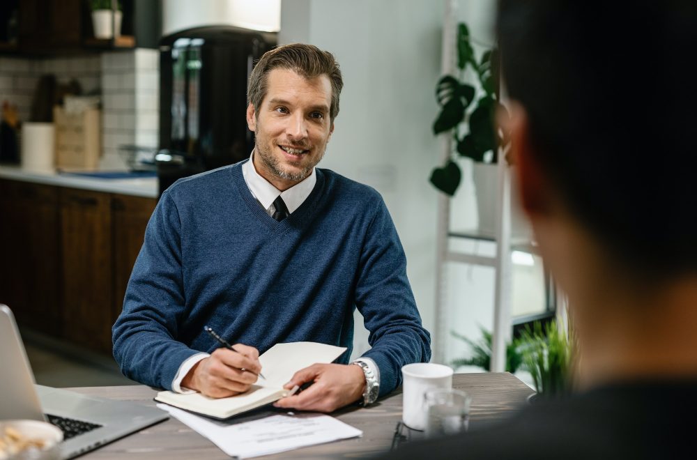 financial-consultant-planning-home-finances-with-his-client-.jpg financial-consultant-planning-home-finances-with-his-client-.jpg