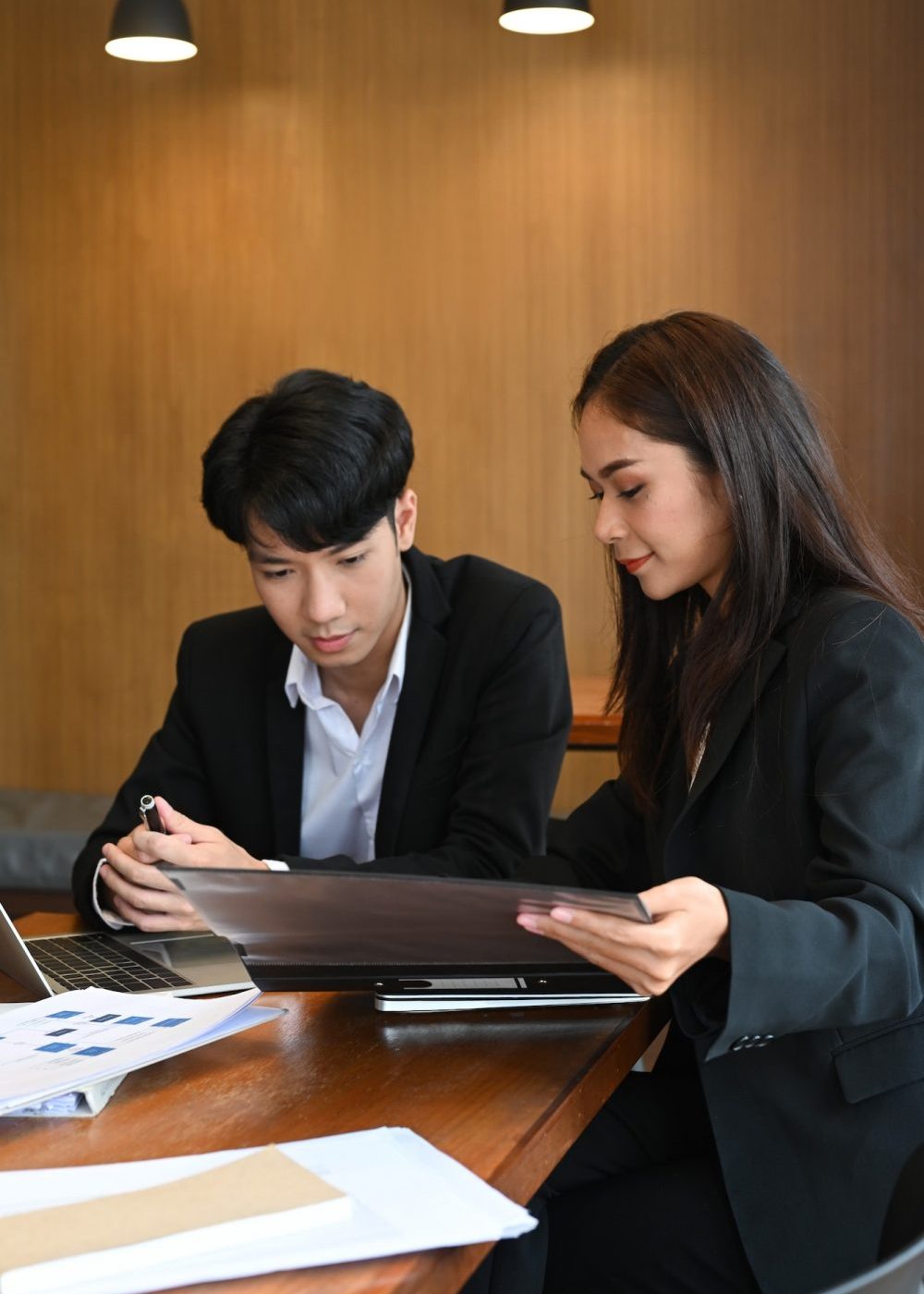 two-business-partners-discussing-financial-reports-together-in-modern-workplace–e1670796180444.jpg two-business-partners-discussing-financial-reports-together-in-modern-workplace--e1670796180444.jpg